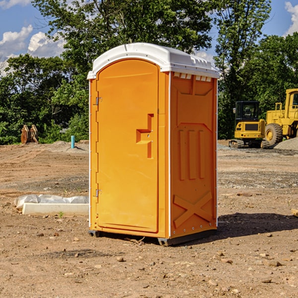 how often are the portable restrooms cleaned and serviced during a rental period in Stacy